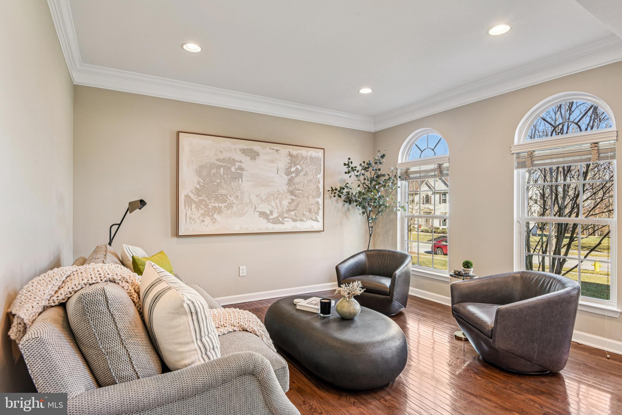 1705 Wolcott Way Hanover, MD 21076 - Photo 9 of 67 a living room with furniture and a large window