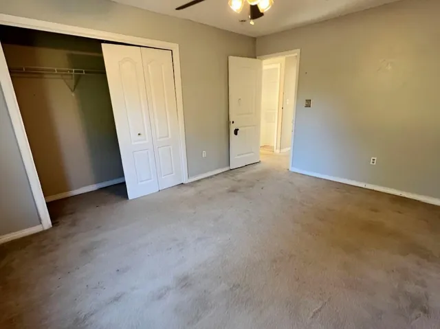 an empty room with a bathroom