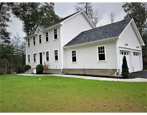 8 Littleton Road Ayer, MA 01432 - Photo 1 of 17 a front view of a house with a yard