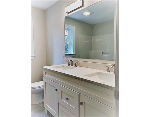 8 Littleton Road Ayer, MA 01432 - Photo 11 of 17 a bathroom with a granite countertop sink and a toilet