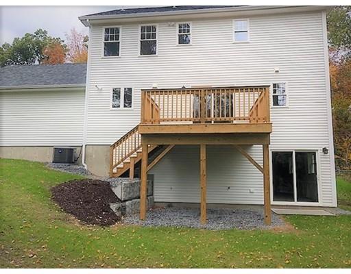 8 Littleton Road Ayer, MA 01432 - Photo 14 of 17 a view of front of house with a yard
