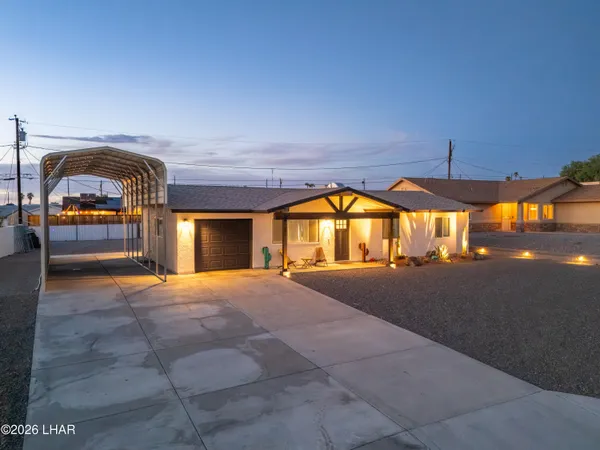 a front view of a house with a view of a house
