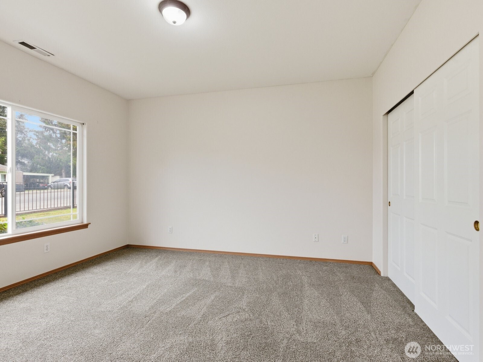 323 North Laventure Road, Unit C Mount Vernon, WA 98273 - Photo 15 of 24 an empty room with a window