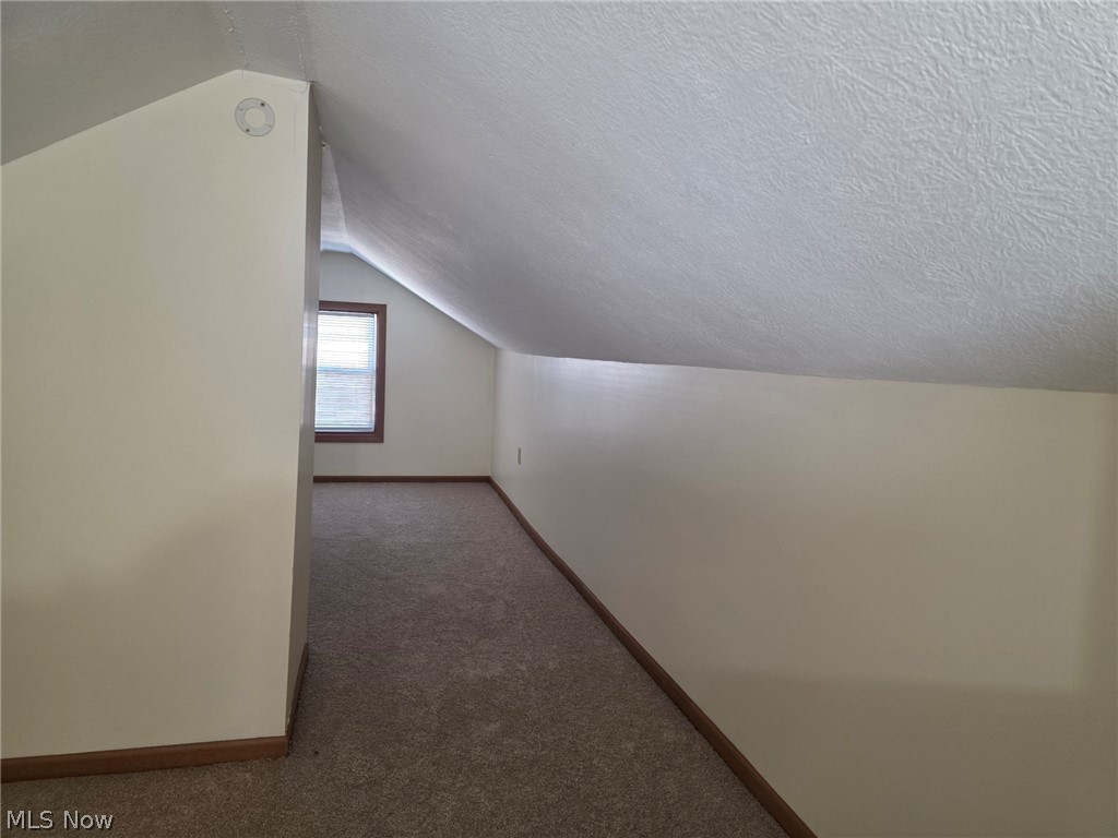95 Erie Street Rittman, OH 44270 - Photo 17 of 25 Finished attic divided into 2 spaces