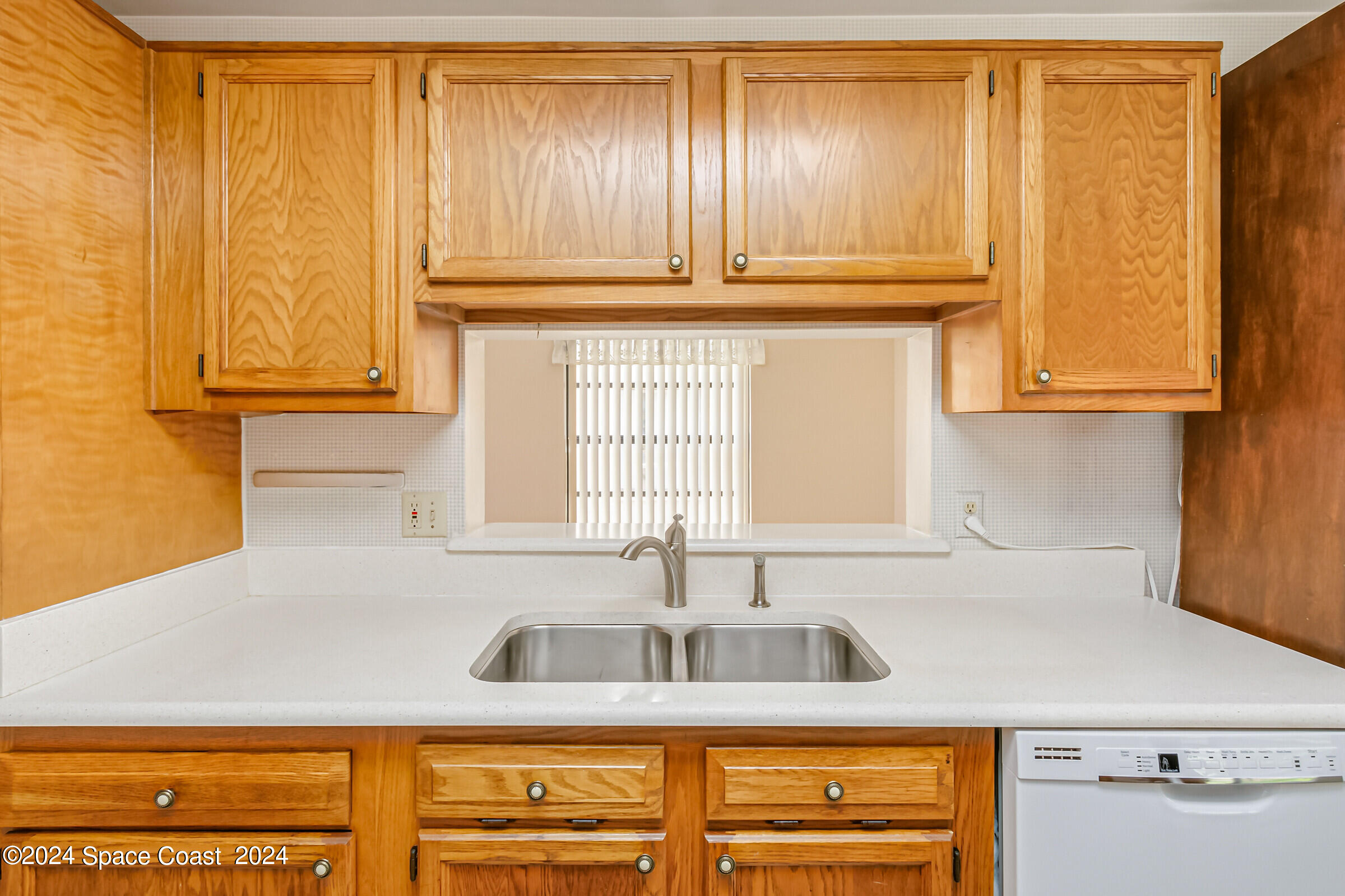 1680 Clover Circle Melbourne, FL 32935 - Photo 13 of 37 Kitchen pass through