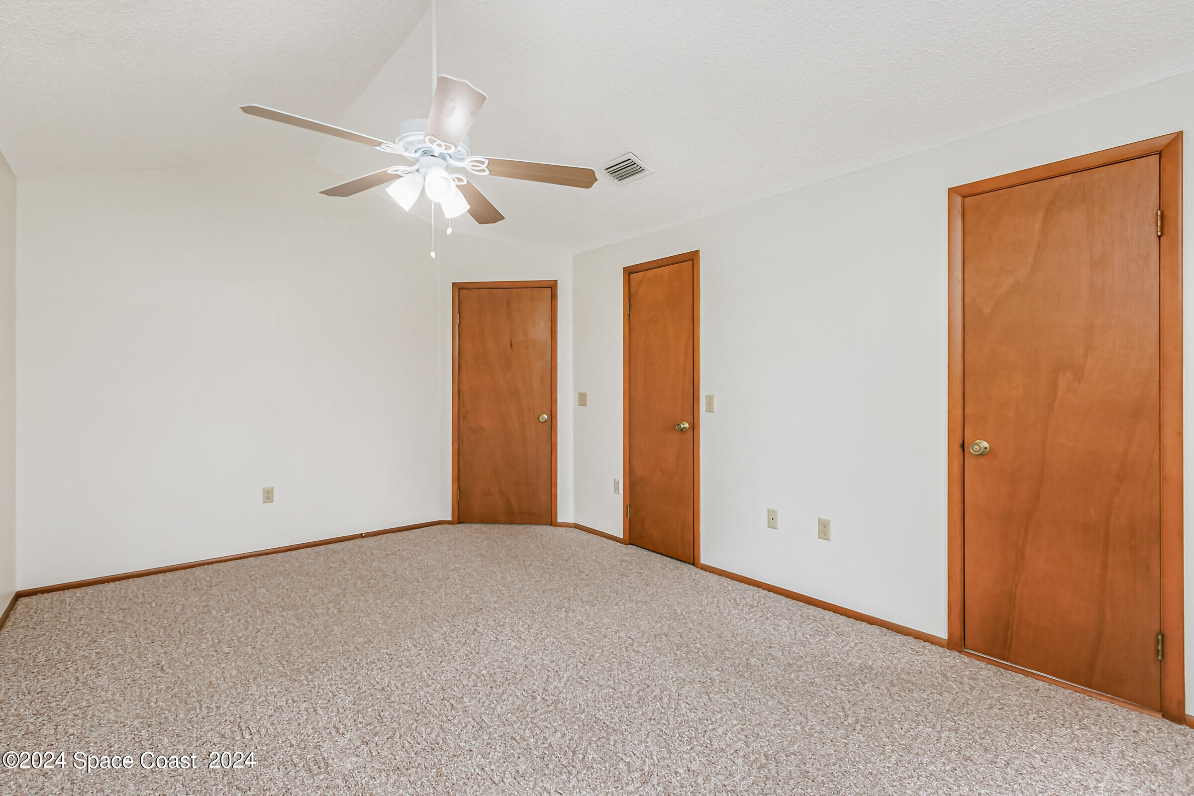1680 Clover Circle Melbourne, FL 32935 - Photo 19 of 37 Primary Suite
