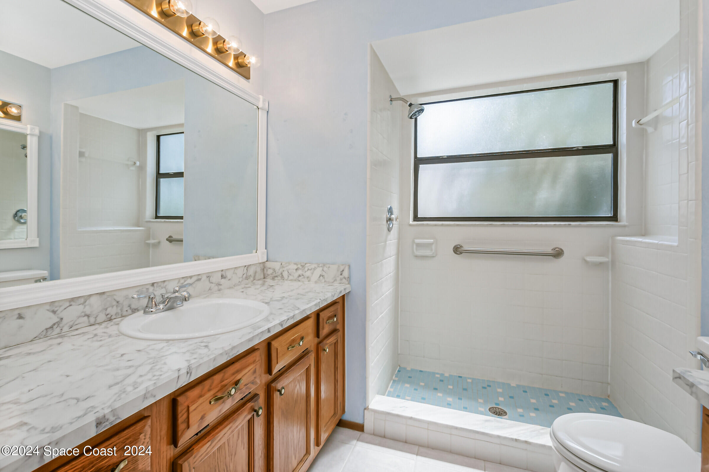 1680 Clover Circle Melbourne, FL 32935 - Photo 23 of 37 Primary Bathroom