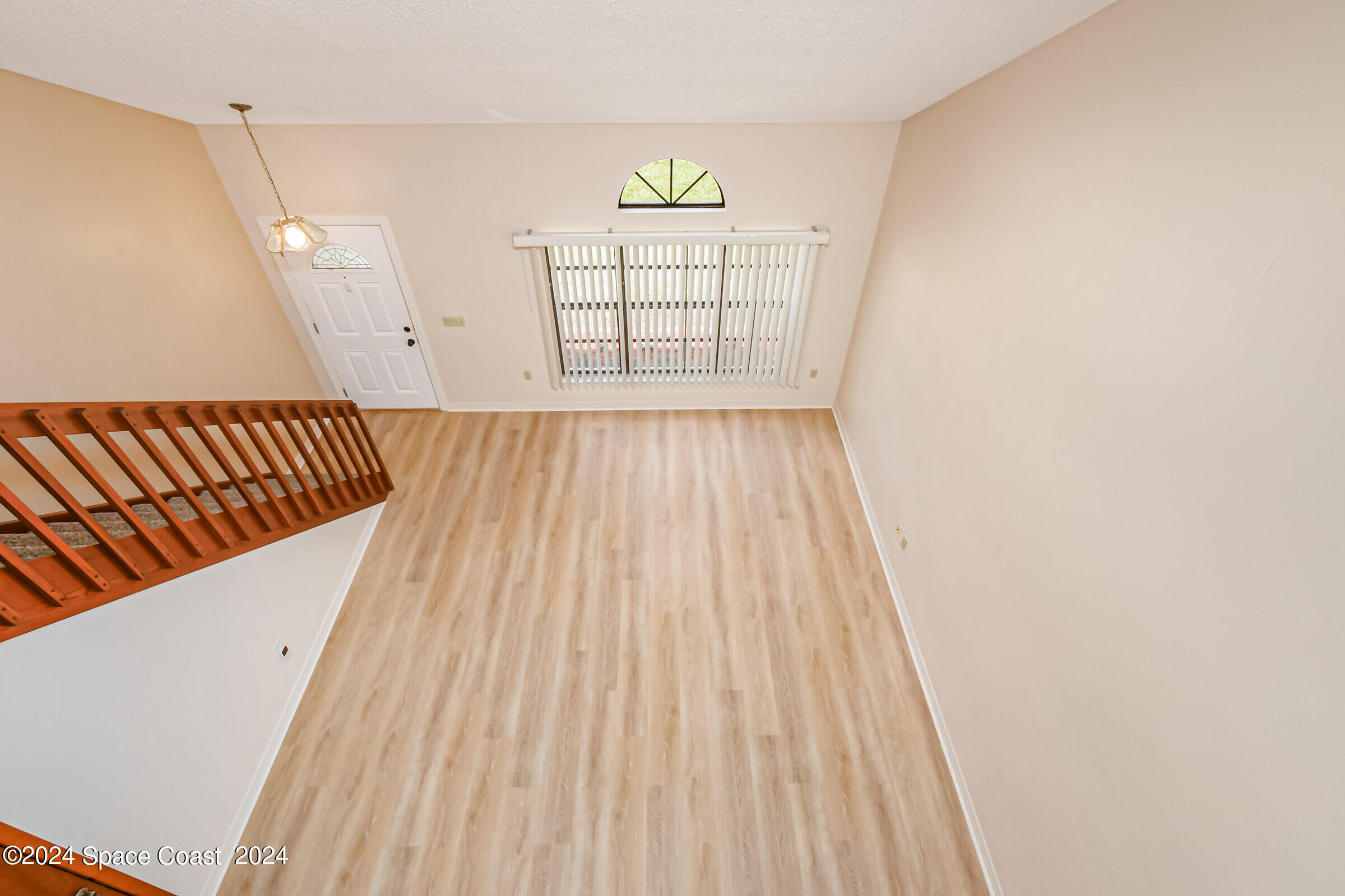 1680 Clover Circle Melbourne, FL 32935 - Photo 29 of 37 Living Room from Loft