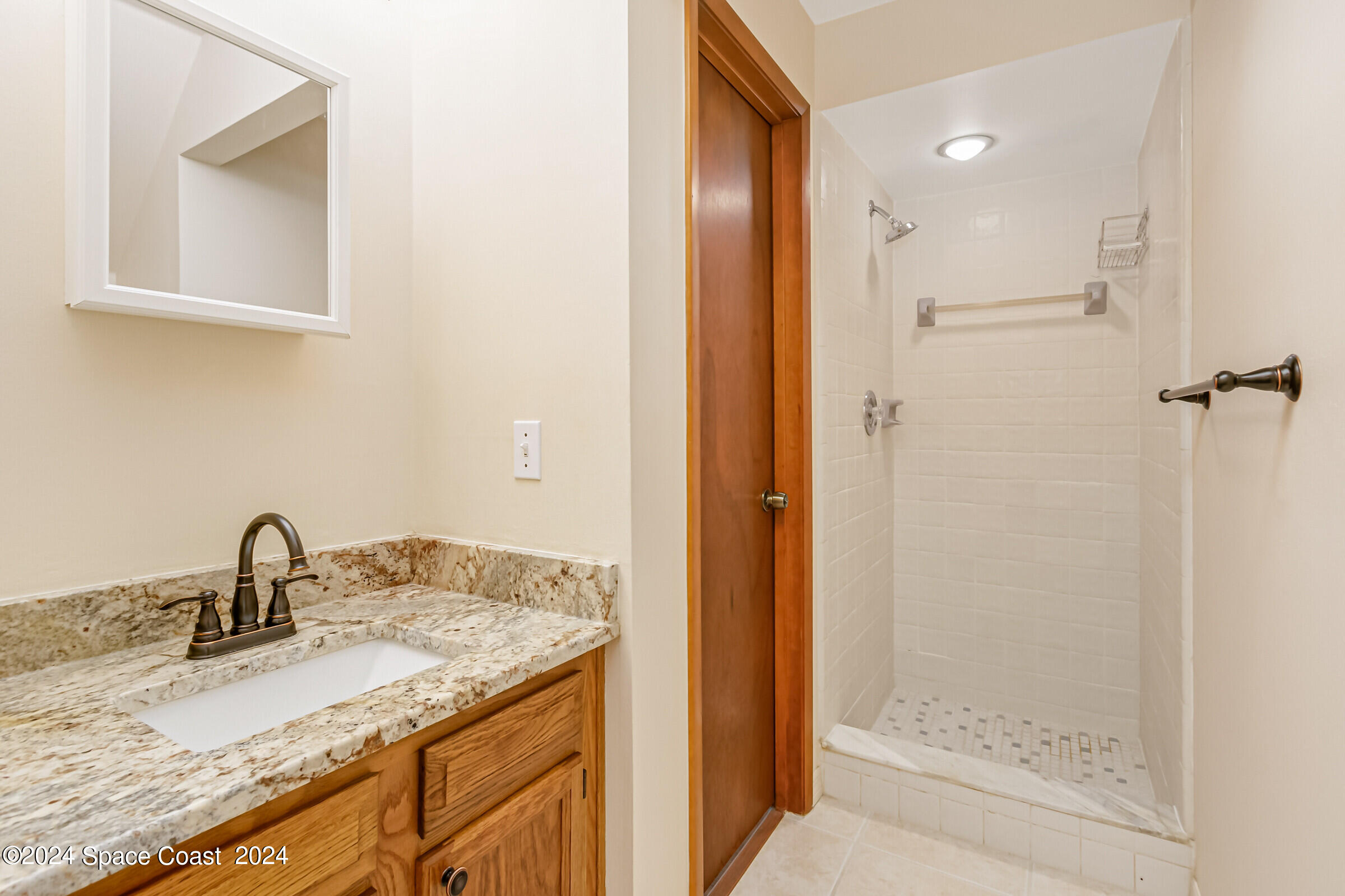 1680 Clover Circle Melbourne, FL 32935 - Photo 32 of 37 Bathroom 3 downstairs