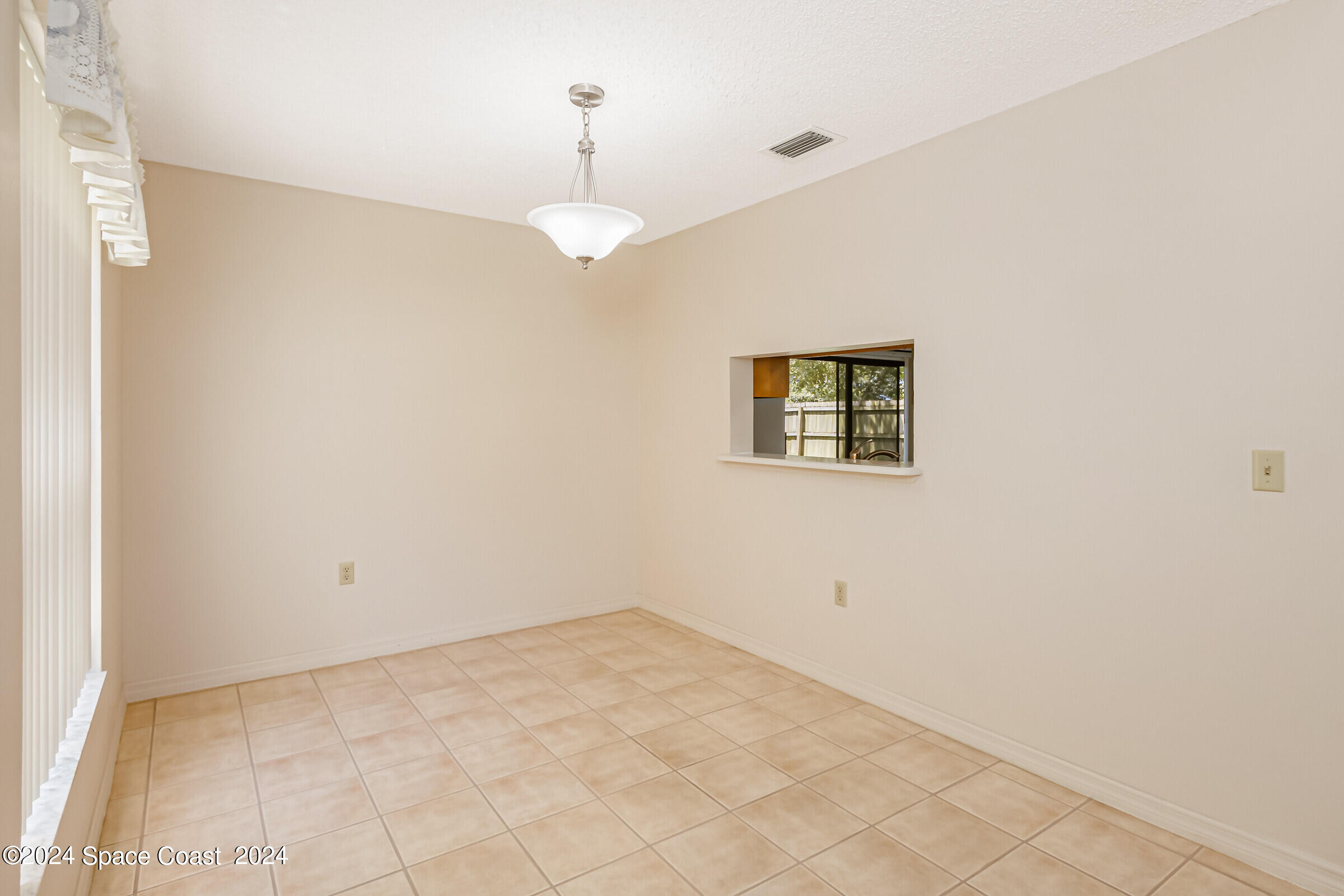 1680 Clover Circle Melbourne, FL 32935 - Photo 8 of 37 Dining pass through