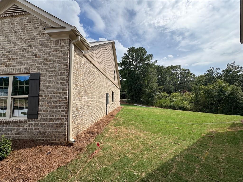 946 Lakeview Oaks Court Grayson, GA 30017 - Photo 2 of 25 a view of a backyard