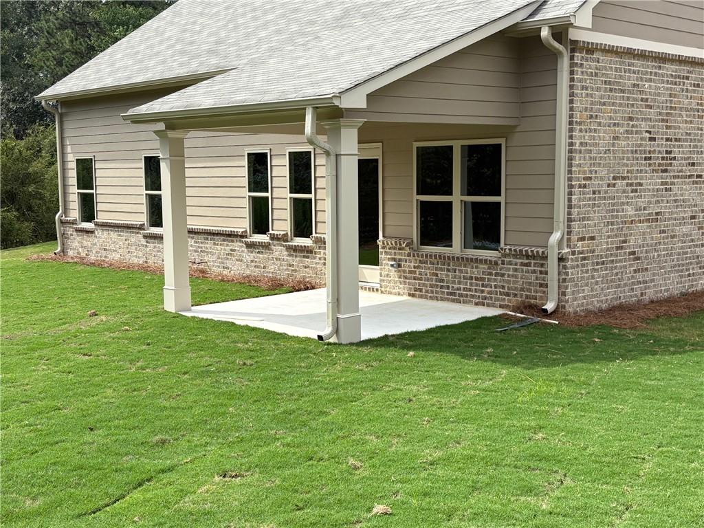 946 Lakeview Oaks Court Grayson, GA 30017 - Photo 25 of 25 a front view of a house with yard
