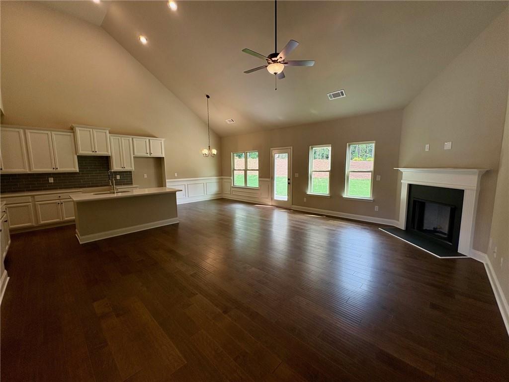 946 Lakeview Oaks Court Grayson, GA 30017 - Photo 7 of 25 an open kitchen with sink and cabinet