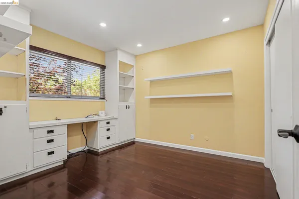 a view of workspace with wooden floor