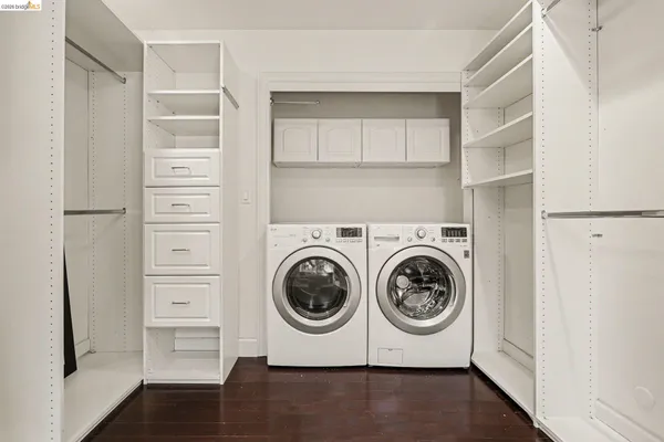 a utility room with washer and dryer