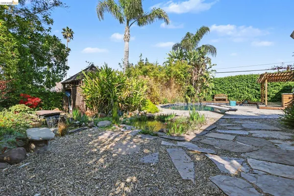 a view of a swimming pool with a patio