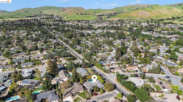 an aerial view of a city with lots of residential buildings