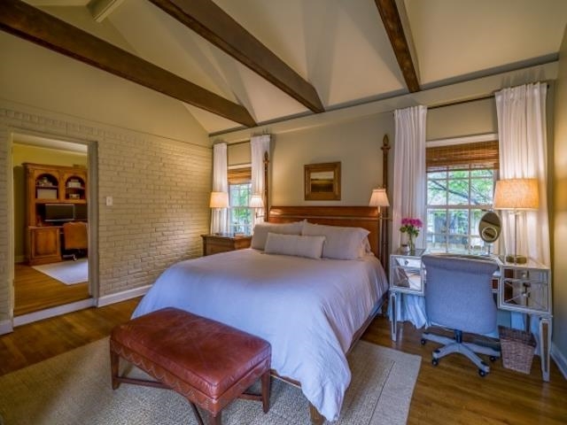 4309 Sequoia Road Memphis, TN 38117 - Photo 18 of 25 a bedroom with a bed window and a desk