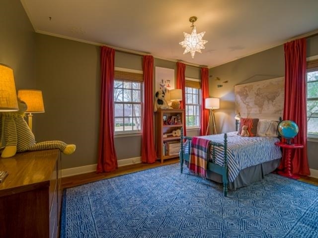4309 Sequoia Road Memphis, TN 38117 - Photo 22 of 25 a living room with a bed furniture and a window