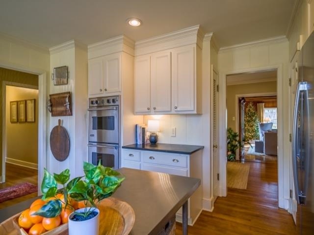 4309 Sequoia Road Memphis, TN 38117 - Photo 8 of 25 a kitchen with a table and chairs in it