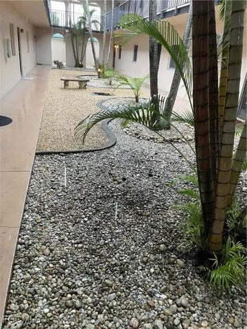 a view of multiple houses with a yard