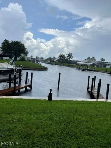 a view of a lake with a garden