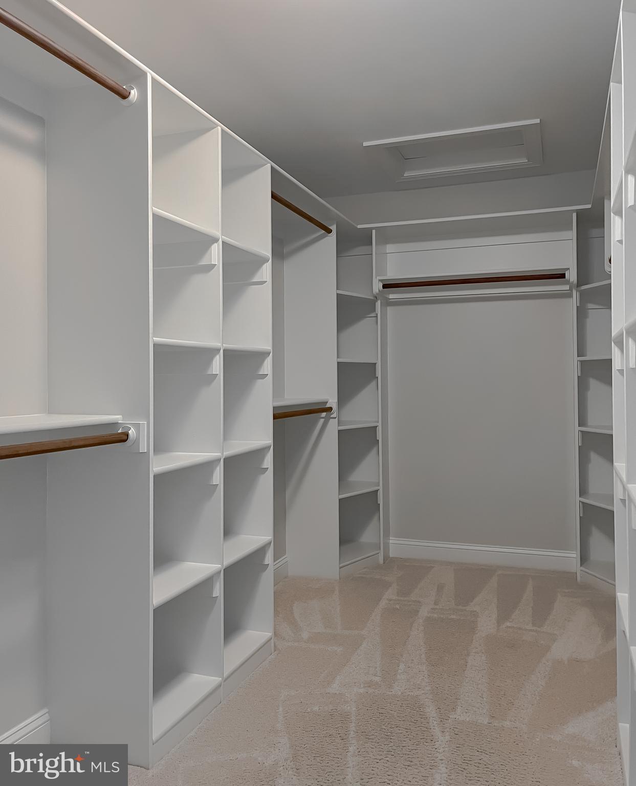 24754 Half Pone Point Road Hollywood, MD 20636 - Photo 106 of 137 a view of walk in closet with empty racks