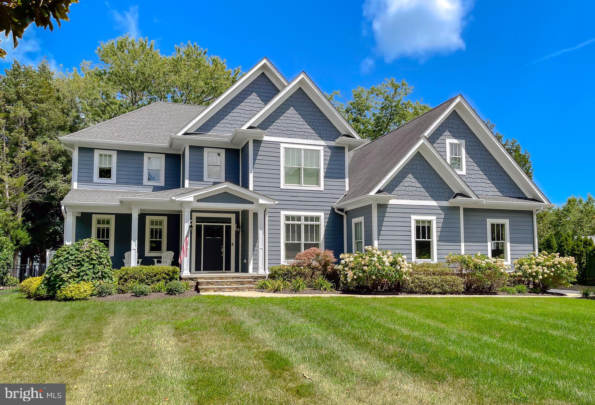 24754 Half Pone Point Road Hollywood, MD 20636 - Photo 11 of 137 front view of a house with a yard