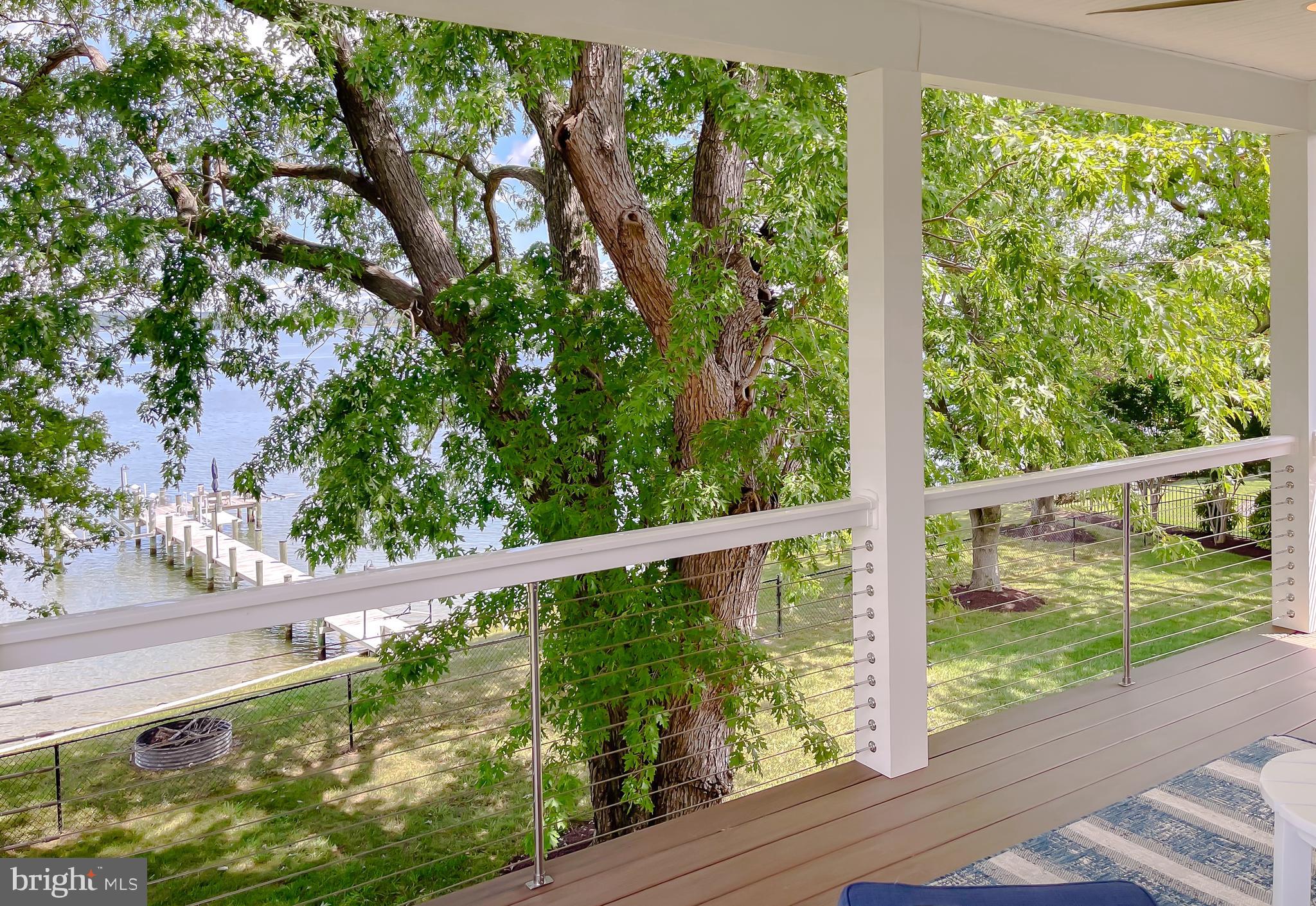 24754 Half Pone Point Road Hollywood, MD 20636 - Photo 115 of 137 a view of a deck with a yard