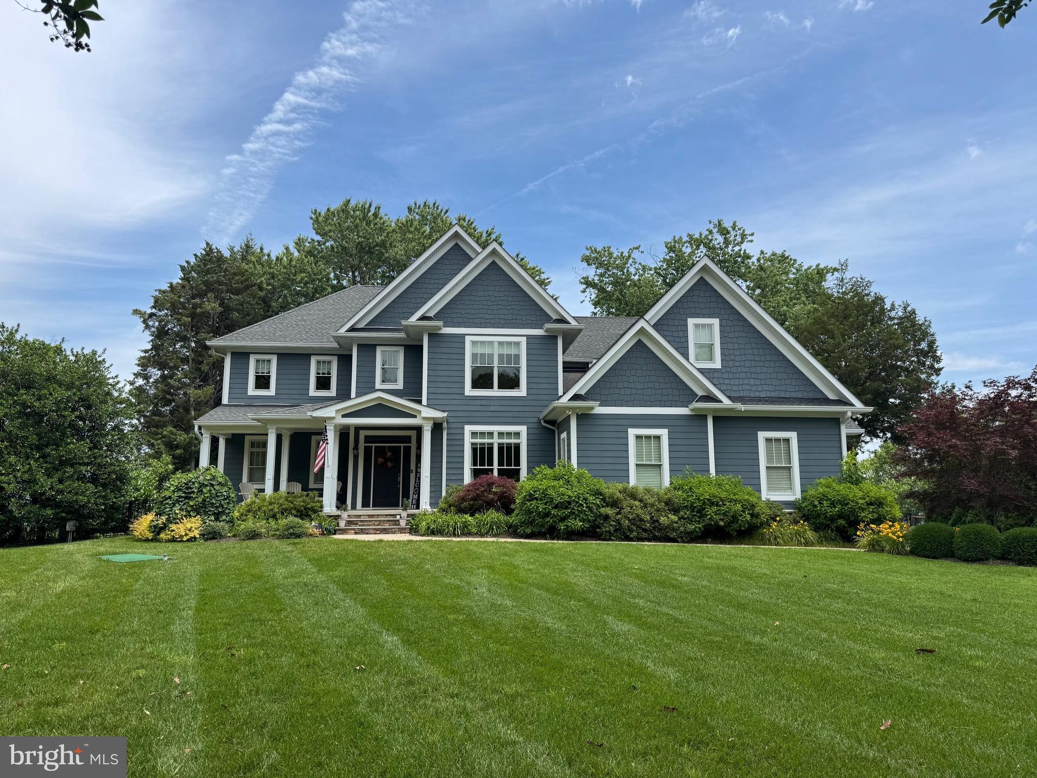 24754 Half Pone Point Road Hollywood, MD 20636 - Photo 12 of 137 a front view of a house with a garden