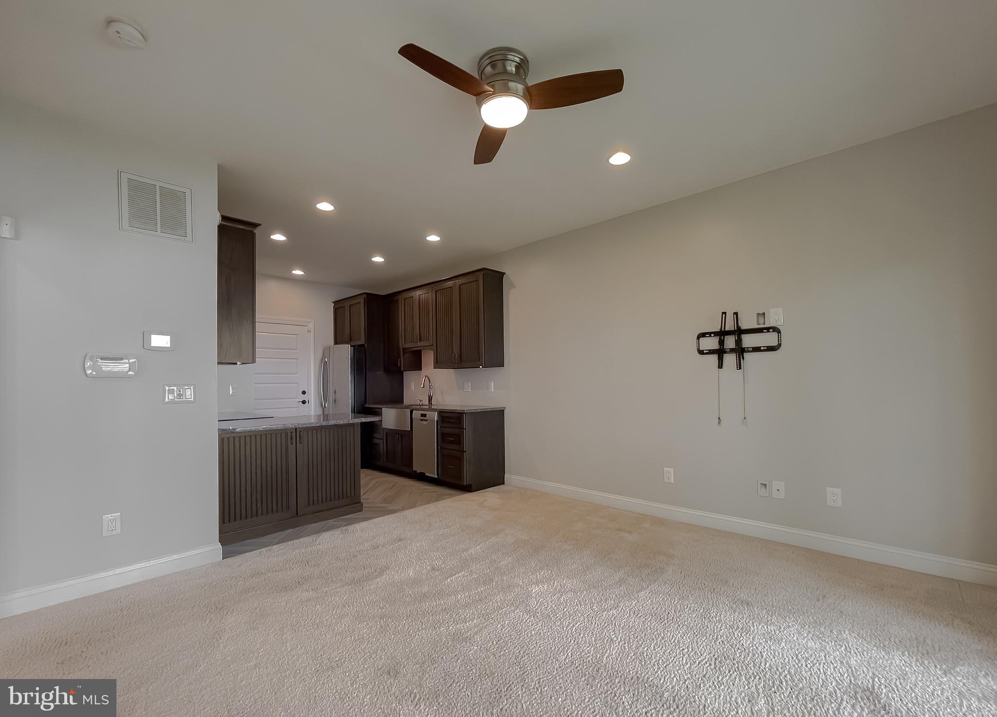 24754 Half Pone Point Road Hollywood, MD 20636 - Photo 126 of 137 a view of a kitchen with a sink and a refrigerator