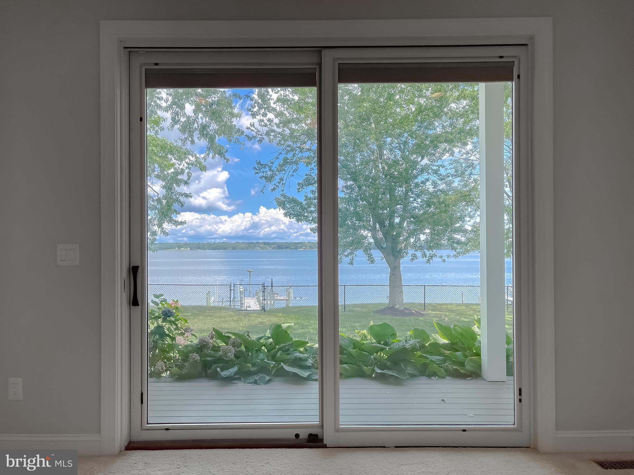 24754 Half Pone Point Road Hollywood, MD 20636 - Photo 127 of 137 a view of a glass door with a tree in front of it