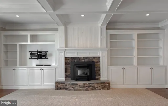 a view of a glass door with a tree in front of it
