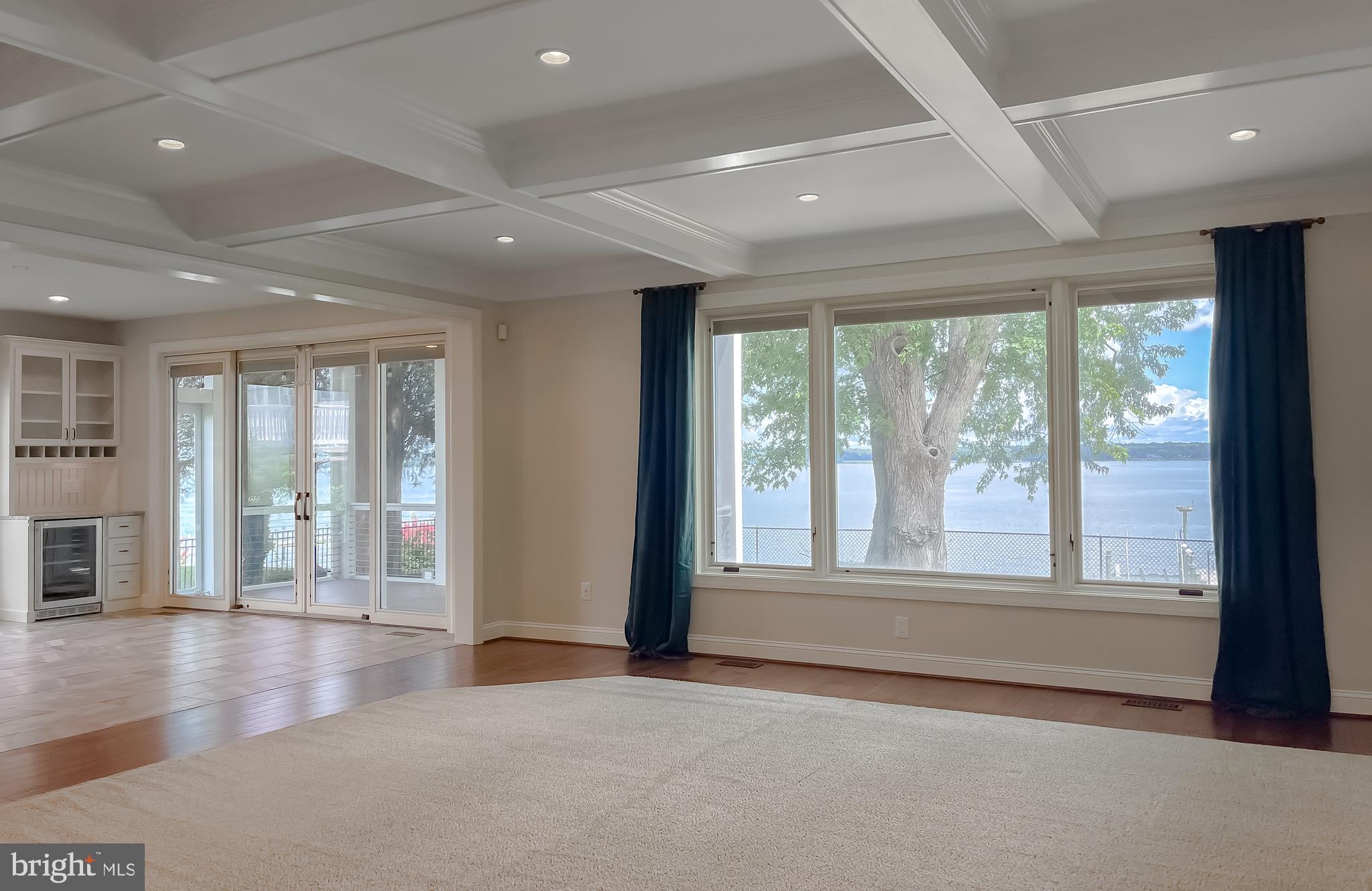 24754 Half Pone Point Road Hollywood, MD 20636 - Photo 50 of 137 a view of an empty room with wooden floor and a window