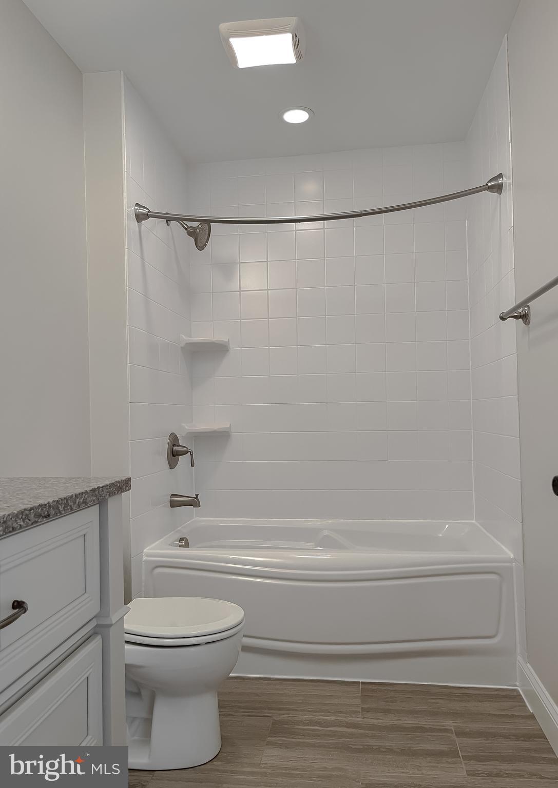 24754 Half Pone Point Road Hollywood, MD 20636 - Photo 72 of 137 a bathroom with a toilet and a shower