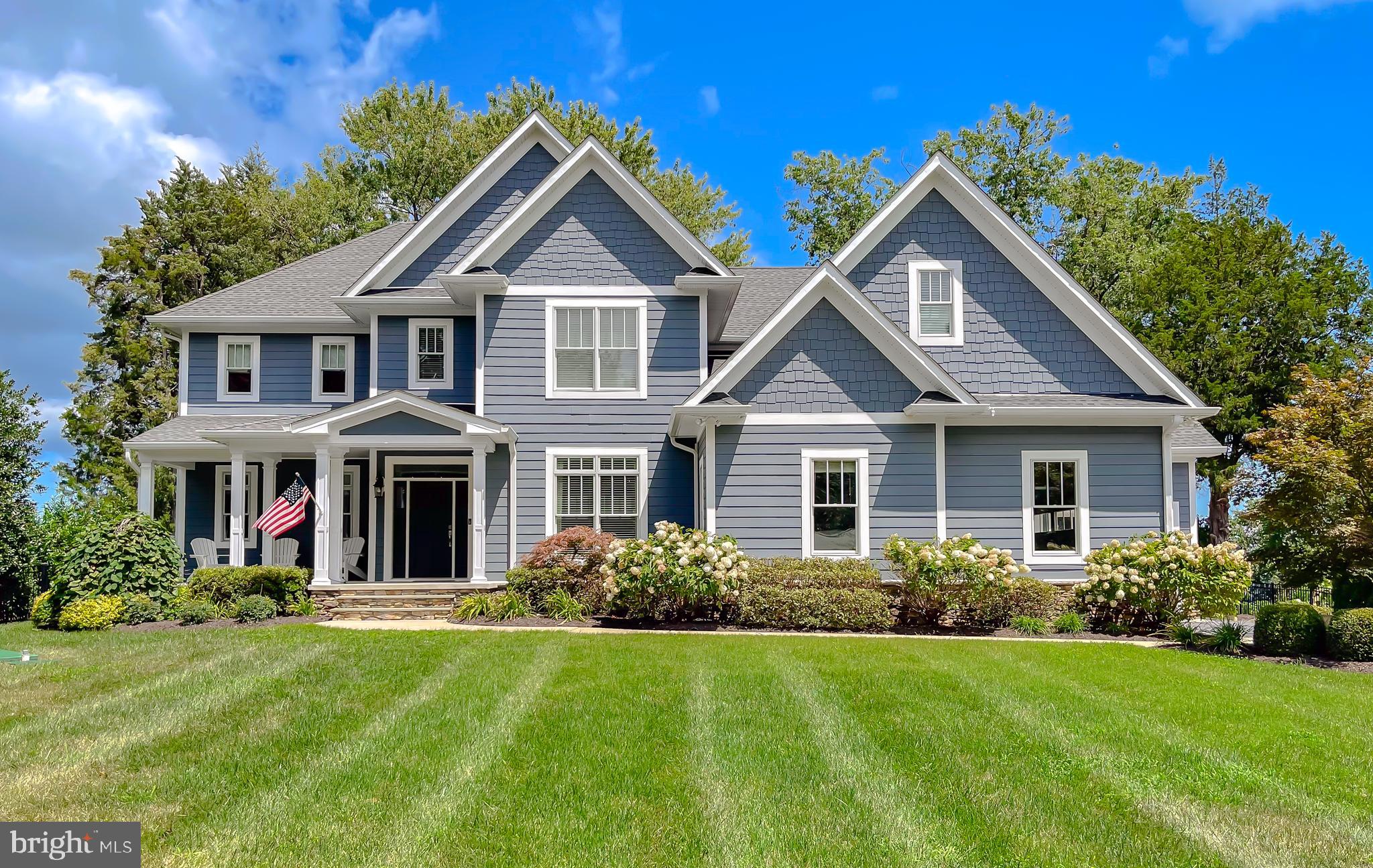 24754 Half Pone Point Road Hollywood, MD 20636 - Photo 10 of 137 a front view of a house with a yard
