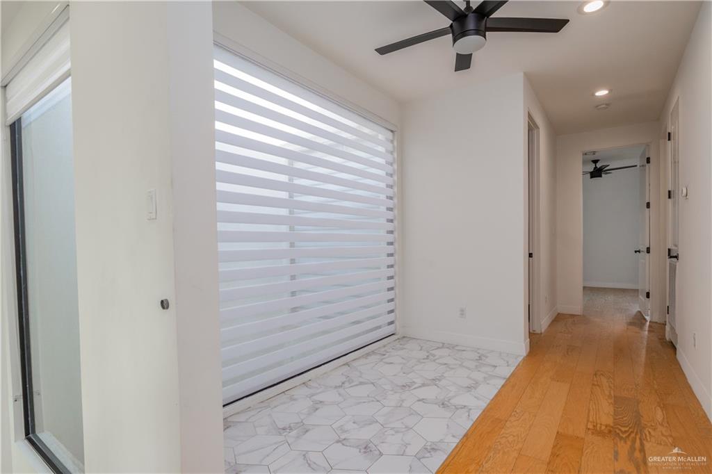 915 Santa Lucia Street Mission, TX 78572 - Photo 13 of 23 Entryway with a ceiling fan, recessed lighting, and light wood-style floors