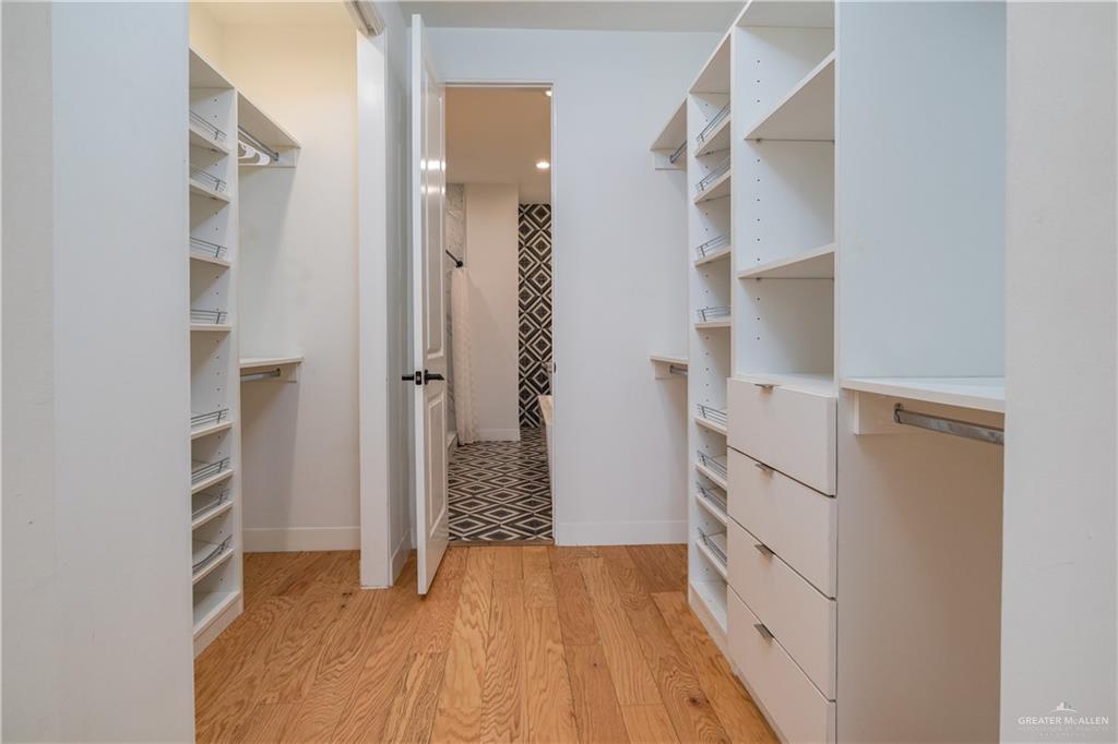 915 Santa Lucia Street Mission, TX 78572 - Photo 9 of 23 Walk in closet featuring light wood-type flooring