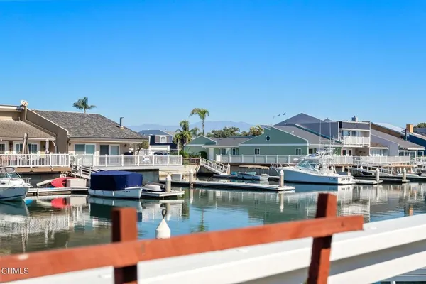 a view of houses with river and lake view