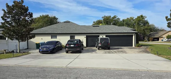 a car parked in front of a house