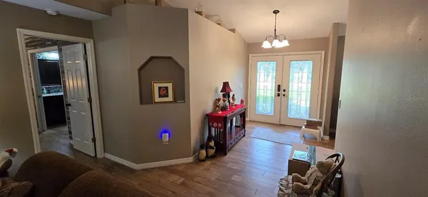 a bathroom with a sink vanity and a mirror