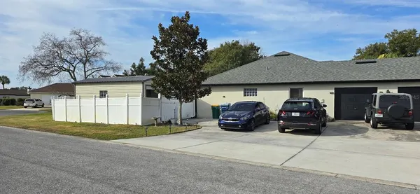 a house with trees in the background