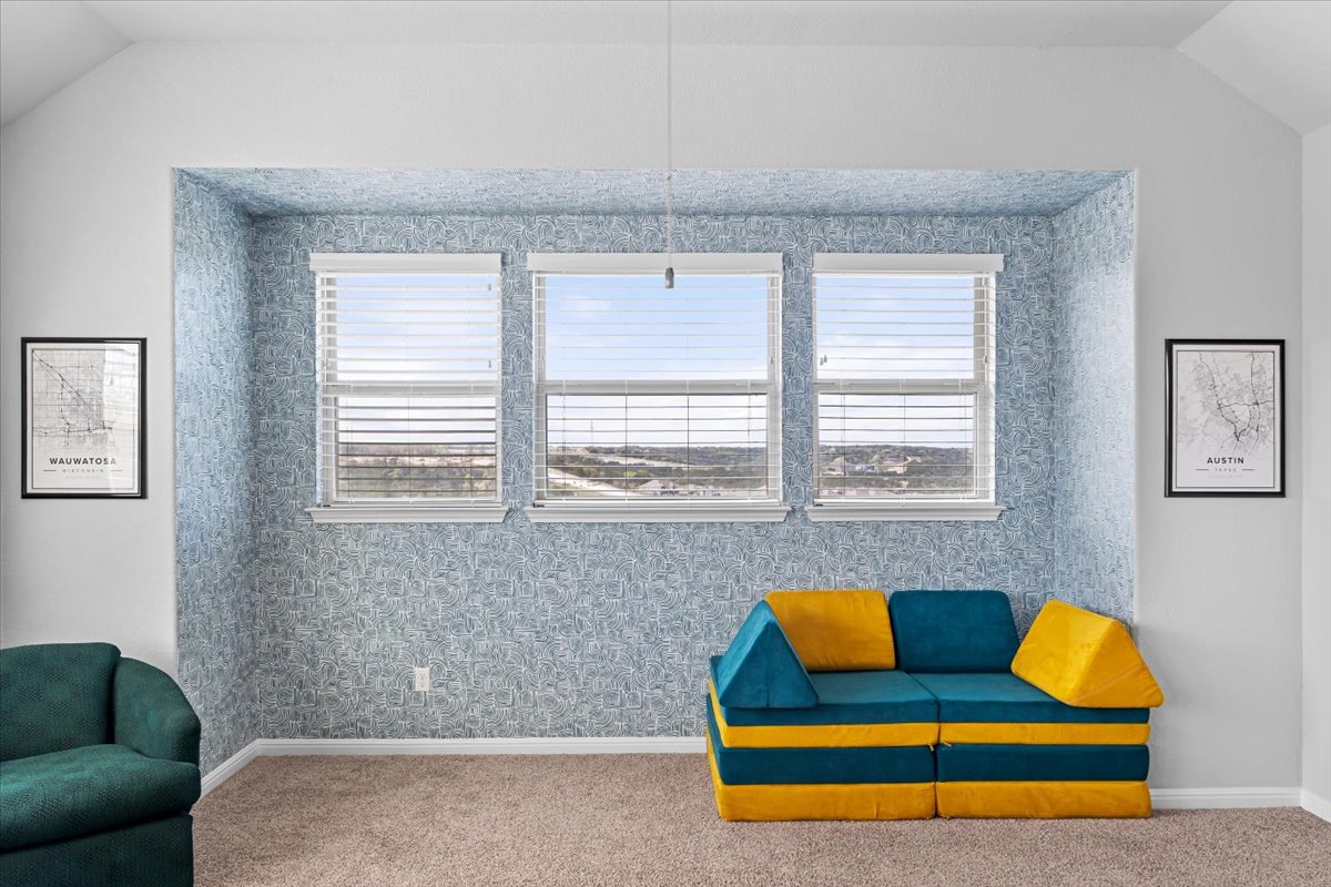 2733 Painted Sky Bend Leander, TX 78641 - Photo 25 of 35 a living room with furniture and a window