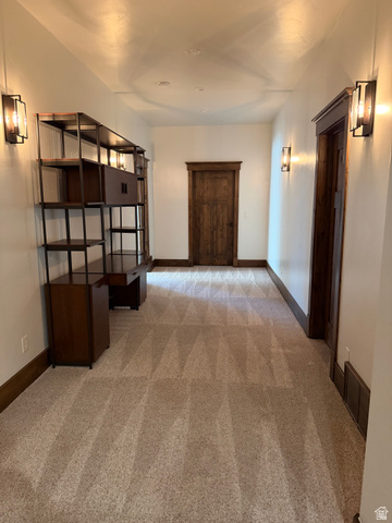 4536 North 475 East Provo, UT 84604 - Photo 20 of 65 Carpeted hallway featuring recessed lighting and wall sconces