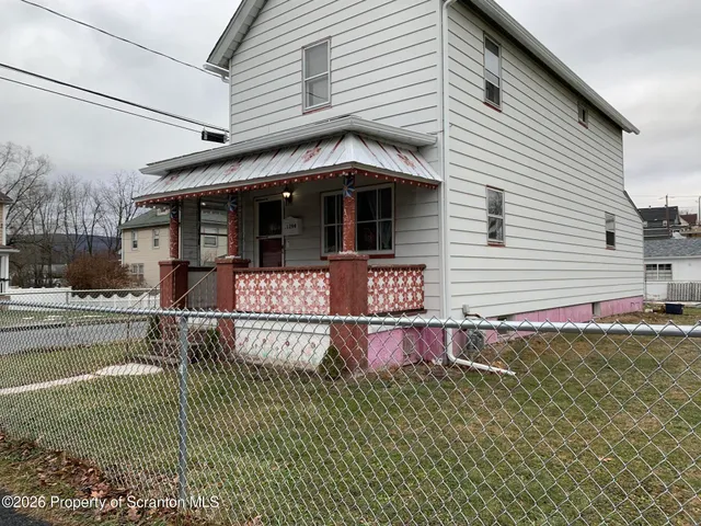 a view of a house with a patio