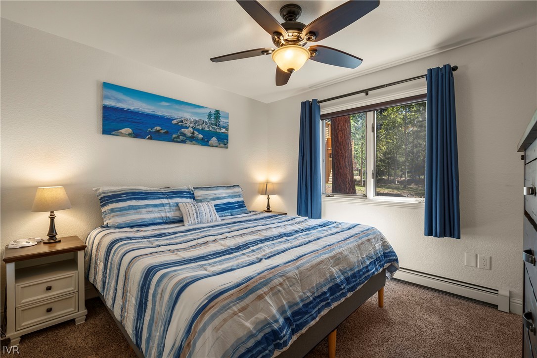939 Incline Way, Unit 200 Incline Village, NV 89451 - Photo 16 of 27 a bedroom with bed and a window