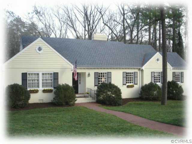 207 Culpepper Road Richmond, VA 23229 - Photo 1 of 1 a front view of house with a garden