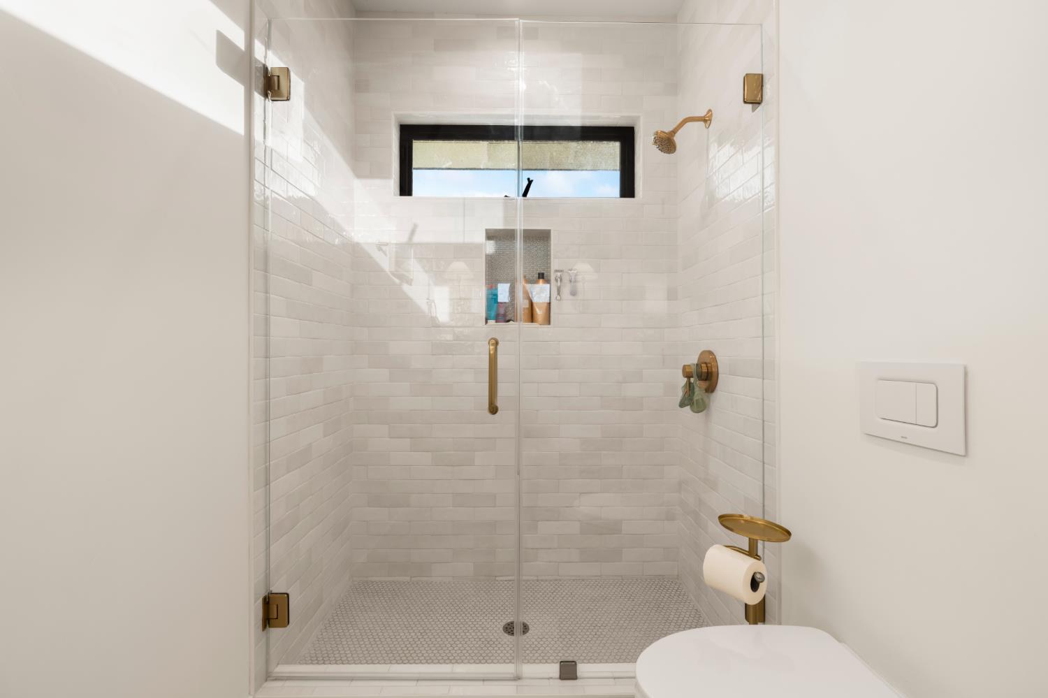 7697 Horseshoe Bar Road Loomis, CA 95650 - Photo 52 of 76 a bathroom with a shower and toilet