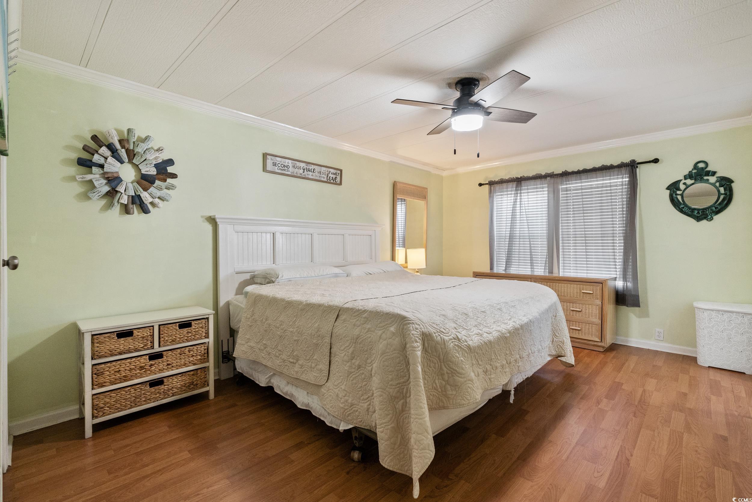 2003 Bittern Drive Myrtle Beach, SC 29575 - Photo 12 of 40 Bedroom with ornamental molding, hardwood / wood-style flooring, and ceiling fan