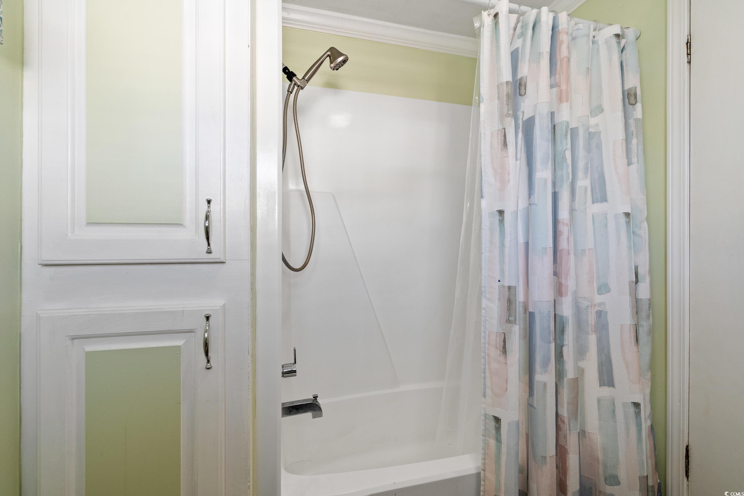 2003 Bittern Drive Myrtle Beach, SC 29575 - Photo 17 of 40 Bathroom featuring shower / bathtub combination with curtain